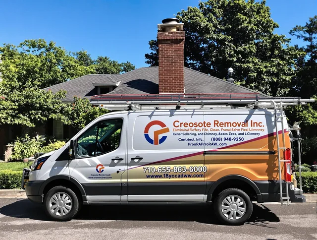 Windsor Locks Chimney Sweep technician removing creosote safely in Windsor Locks, CT
